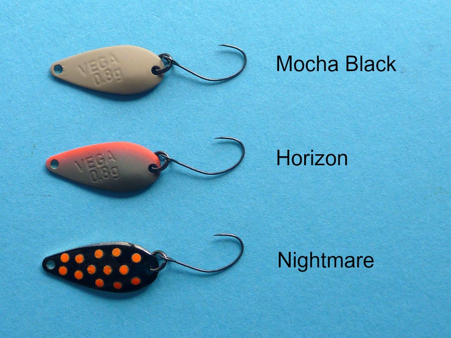 Photo showing three colors of Vega spoons, Mocha, Horizon and Nightmare.