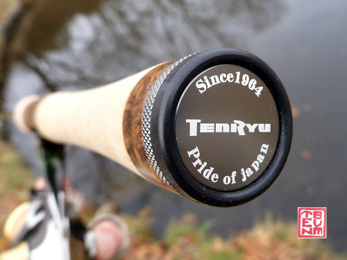 Grip end cap with protective rubber ring