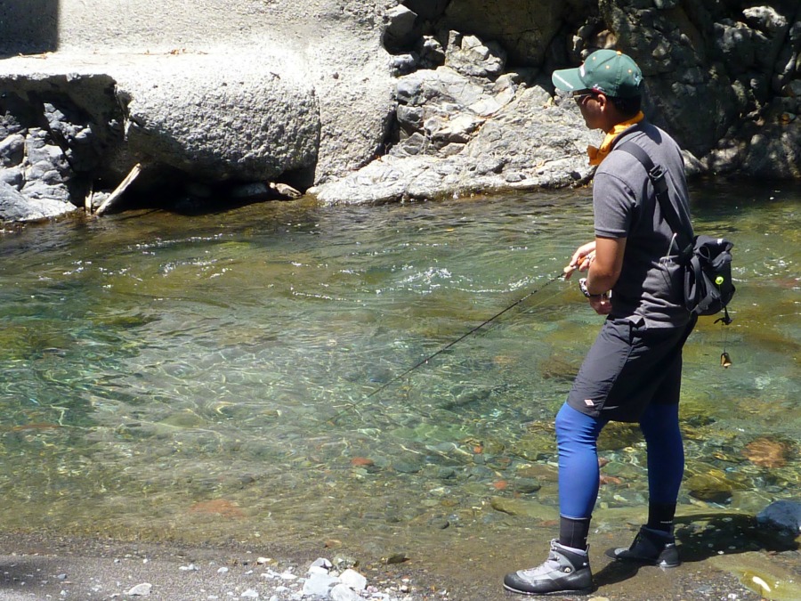 Toshiki Uwamori fishing in a Japanese river.